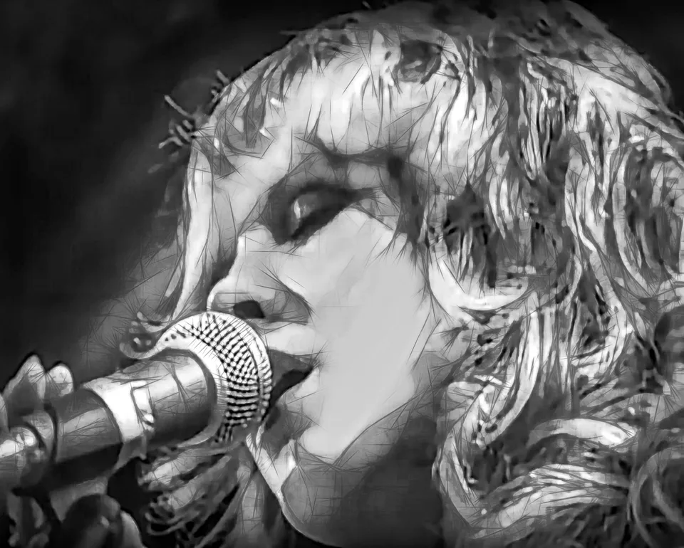 A singer at a microphone in a black-and-white photograph.